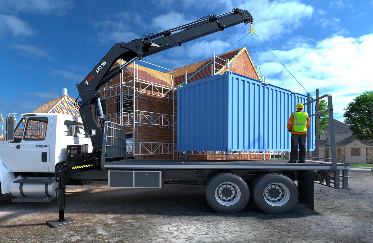 Kran-lastbil leverer container